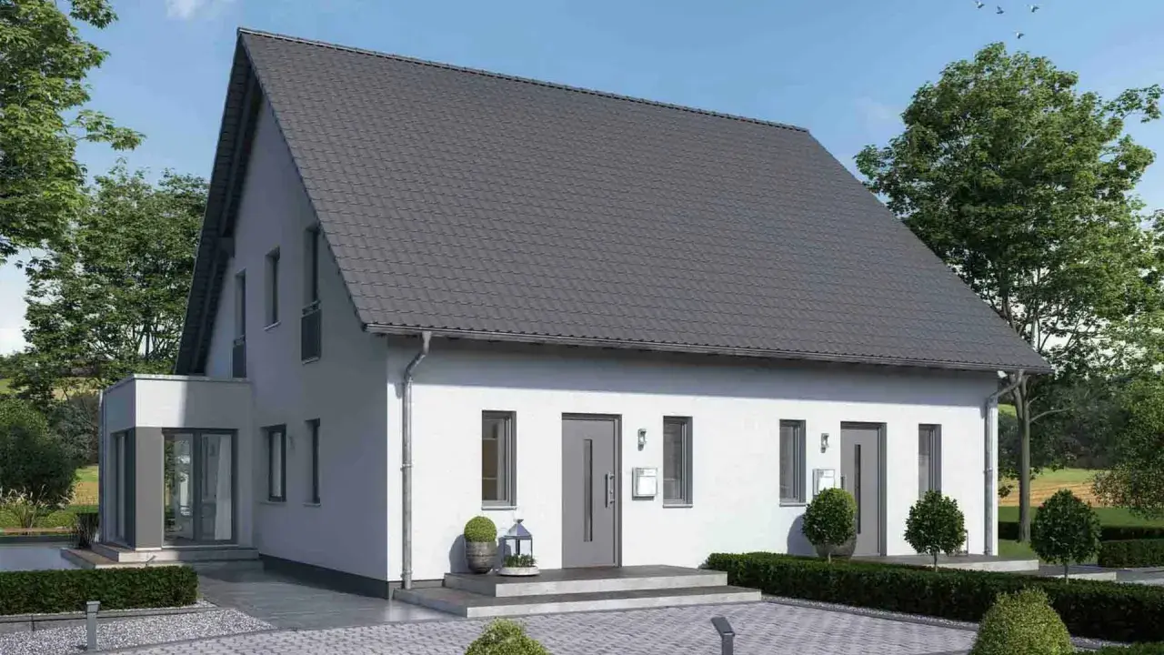 Modernes Doppelhaus mit grauen Ziegeln und weißer Fassade. Informieren Sie sich über die doppelhaus kosten für dieses attraktive Zuhause.