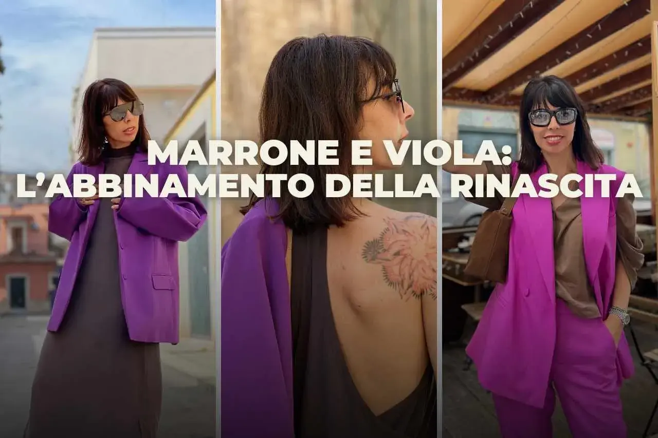 Donna con abito viola e marrone, un abbinamento che esce dalla routine.