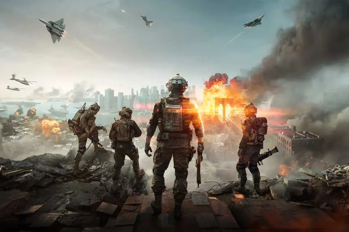 Żołnierze na tle płonącego miasta, samoloty bojowe i helikoptery w powietrzu. Scena z gry Battlefield 6.