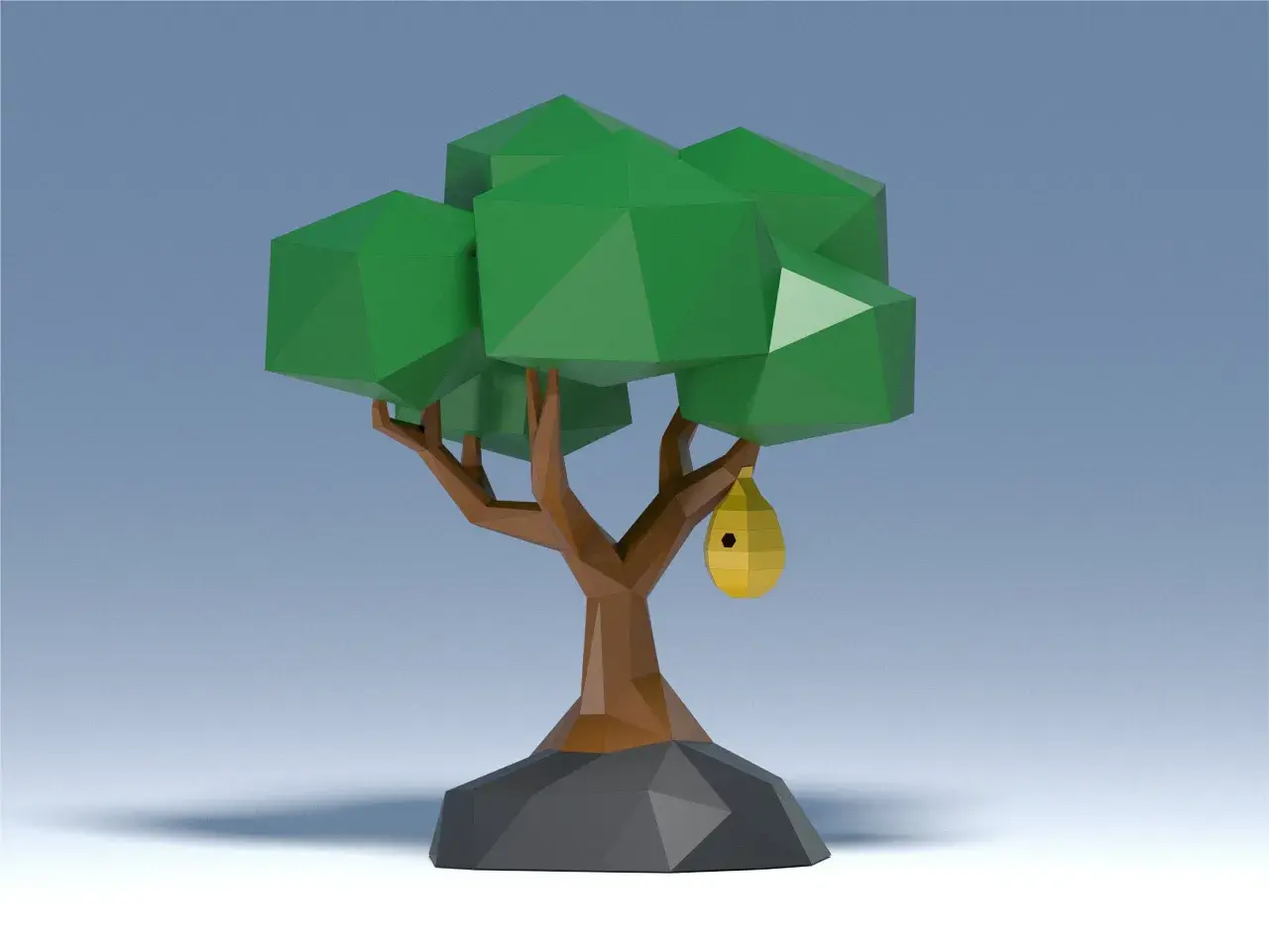 Un árbol de arbol manualidades 3d con un nido amarillo colgando de una rama.