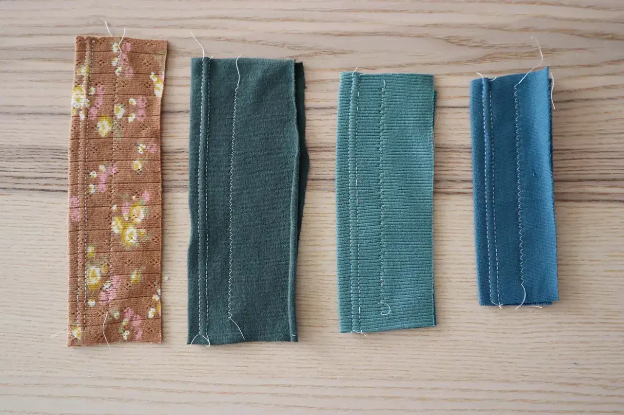 Four fabric swatches, including a floral print and solid colors, show different cut and sew knits techniques with visible white stitching.