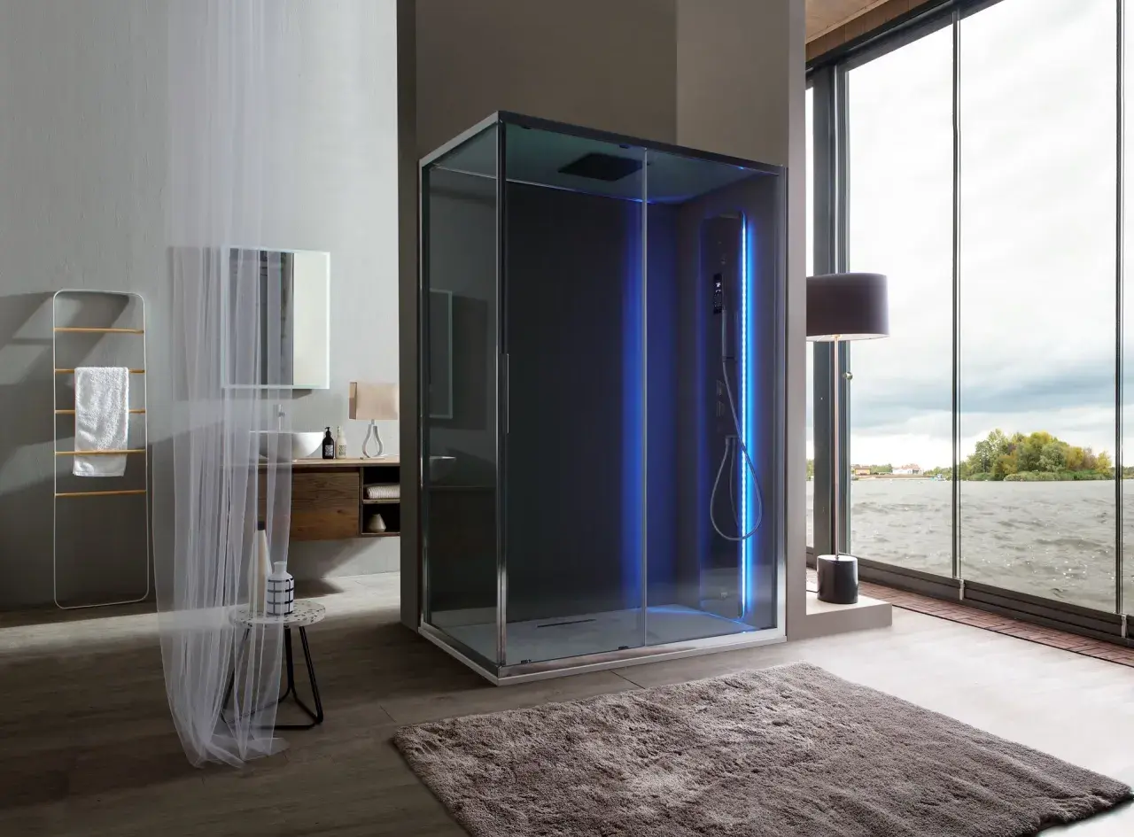Cabina doccia moderna con luci blu per un'esperienza di doccia cromoterapia rilassante.