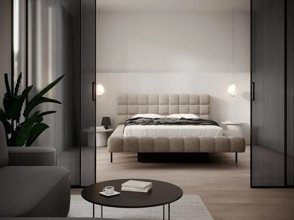 Minimalistyczna sypialnia z tapicerowanym łóżkiem i stolikami nocnymi. Inspiracja, jak umeblować małą sypialnię, by była funkcjonalna i stylowa.