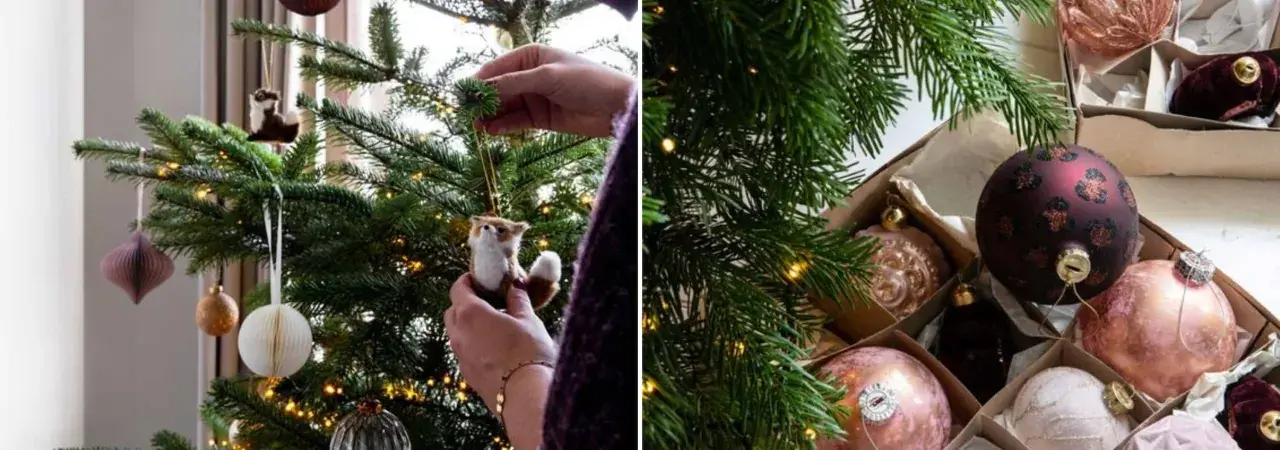 Addobbi per un albero di natale in inglese: palline rosa e bordeaux, decorazioni a forma di volpe e sfere di carta.
