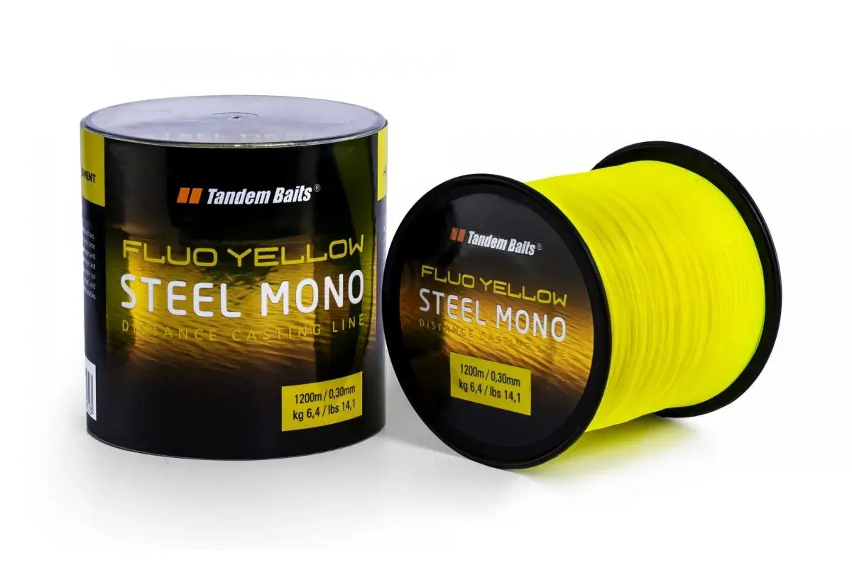 Jasnożółty monofilament "Steel Mono" Tandem Baits na szpulce i w opakowaniu. Idealny do dalekich rzutów.