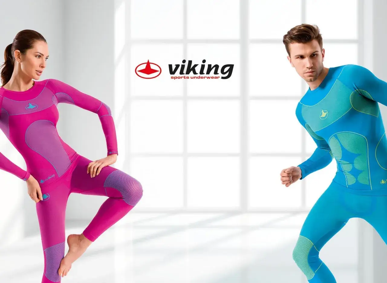 Kobieta w różowym i mężczyzna w niebieskim stroju sportowym. Bielizna termoaktywna Viking dla aktywnych.