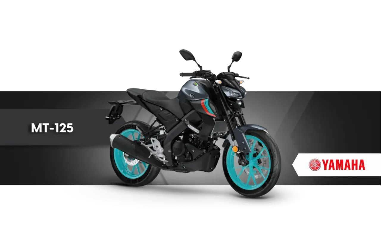 Szary motocykl Yamaha MT-125 z turkusowymi felgami na czarnym tle.