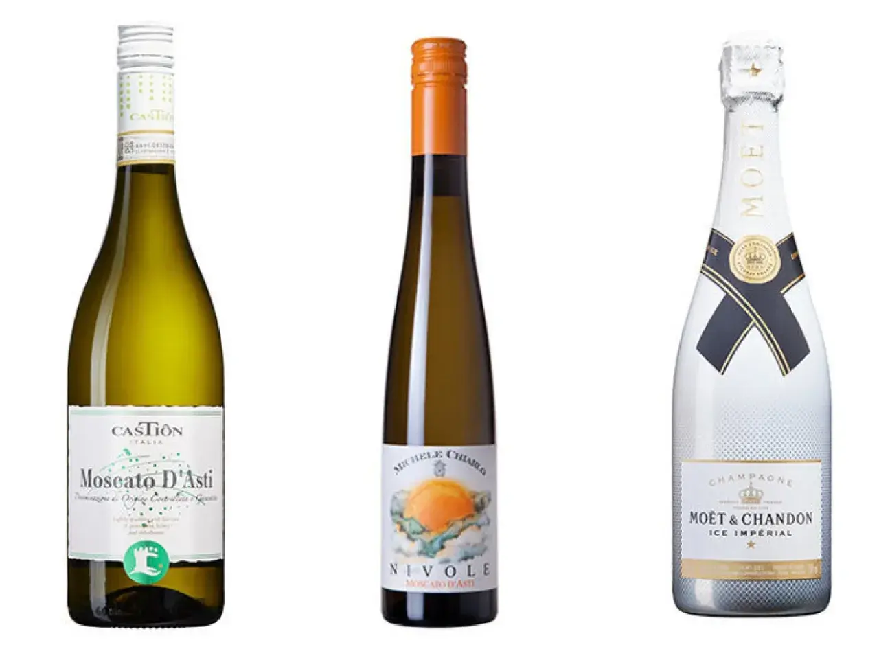 Tre flaskor vin: Moscato d'Asti, Nivole och Moët & Chandon Ice Impérial. Perfekt vin till jordgubbar.