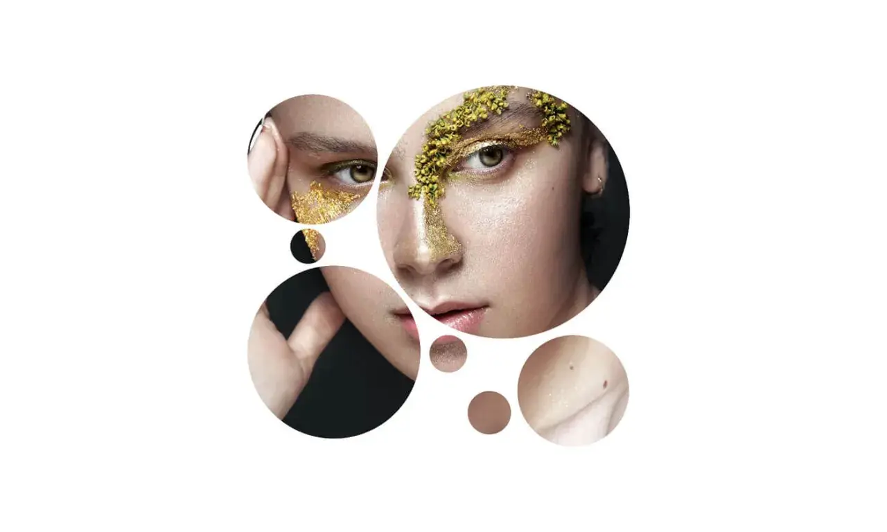 Dettagli di un volto con trucco dorato e elementi naturali, che evocano la cura della pelle e la **medicina estetica specializzazione**.