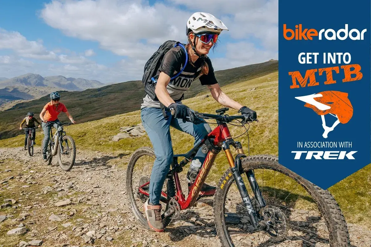 Cyclists ride mountain bikes on a rocky trail. Learn how to build a mountain bike with BikeRadar and Trek.