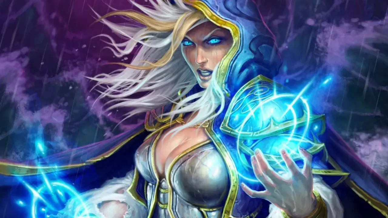 Jaina Proudmoore, czarodziejka z niebieskimi oczami, rzuca zaklęcie. Jej moc jest równie potężna jak siła primaris space marines.
