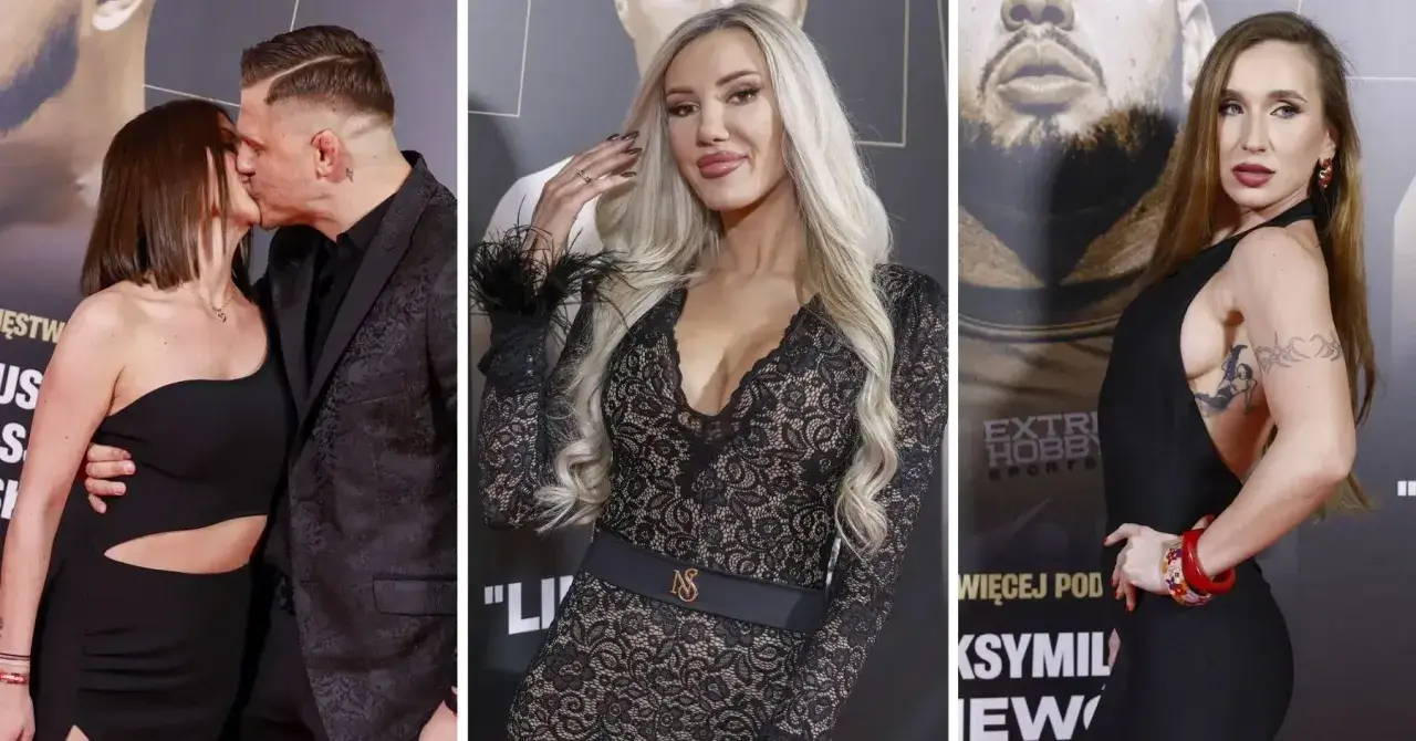 Para na ściance podczas gali Fame MMA. Kobieta w czarnej sukience z wycięciami i mężczyzna w garniturze. Obok dwie inne kobiety w eleganckich kreacjach.