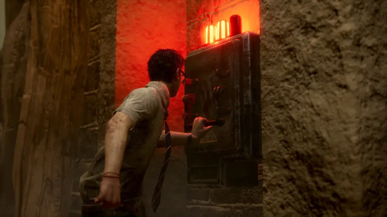 Un survivant ajuste la configuration d'un générateur dans Dead by Daylight, sous une lumière rouge menaçante.
