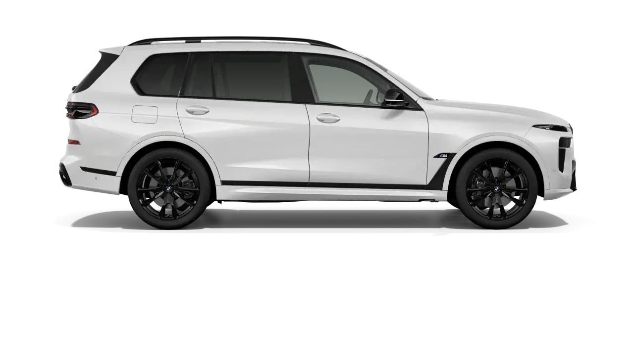 Białe BMW X7 M60i z czarnymi felgami i detalami. Luksusowy SUV gotowy na każdą podróż.