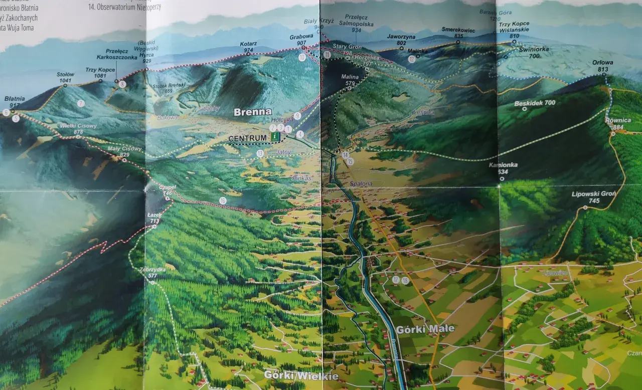 Mapa turystyczna z zaznaczonymi szlakami z Brennej, ukazująca góry, doliny i miejscowości.