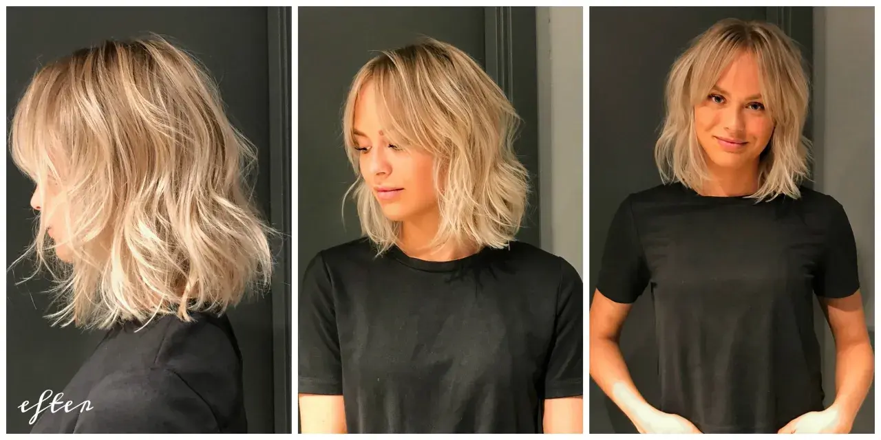 En kvinna med blont, vågigt hår och lugg. Denna page frisyr är stylad med textur och volym.