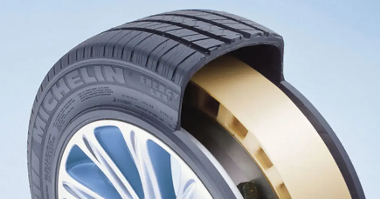 Przekrój opony Michelin z żółtym wzmocnieniem, zapewniającym jazdę typu runflat.