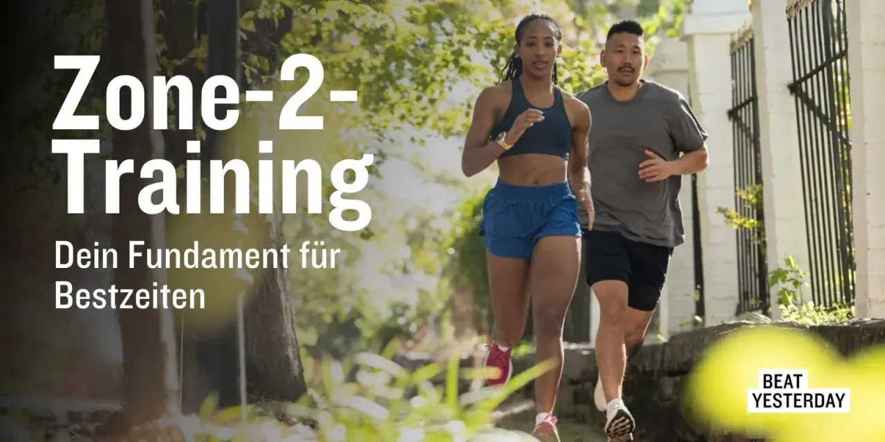 Ein Mann und eine Frau laufen im Freien. Der Text "Zone-2-Training" und "Dein Fundament für Bestzeiten" ist prominent platziert.