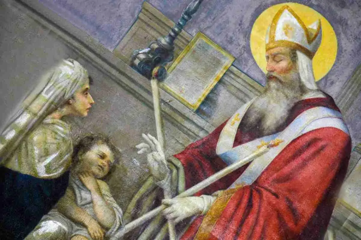 San Biagio, con il suo proverbio di guarigione, benedice un bambino malato, mentre una donna prega.