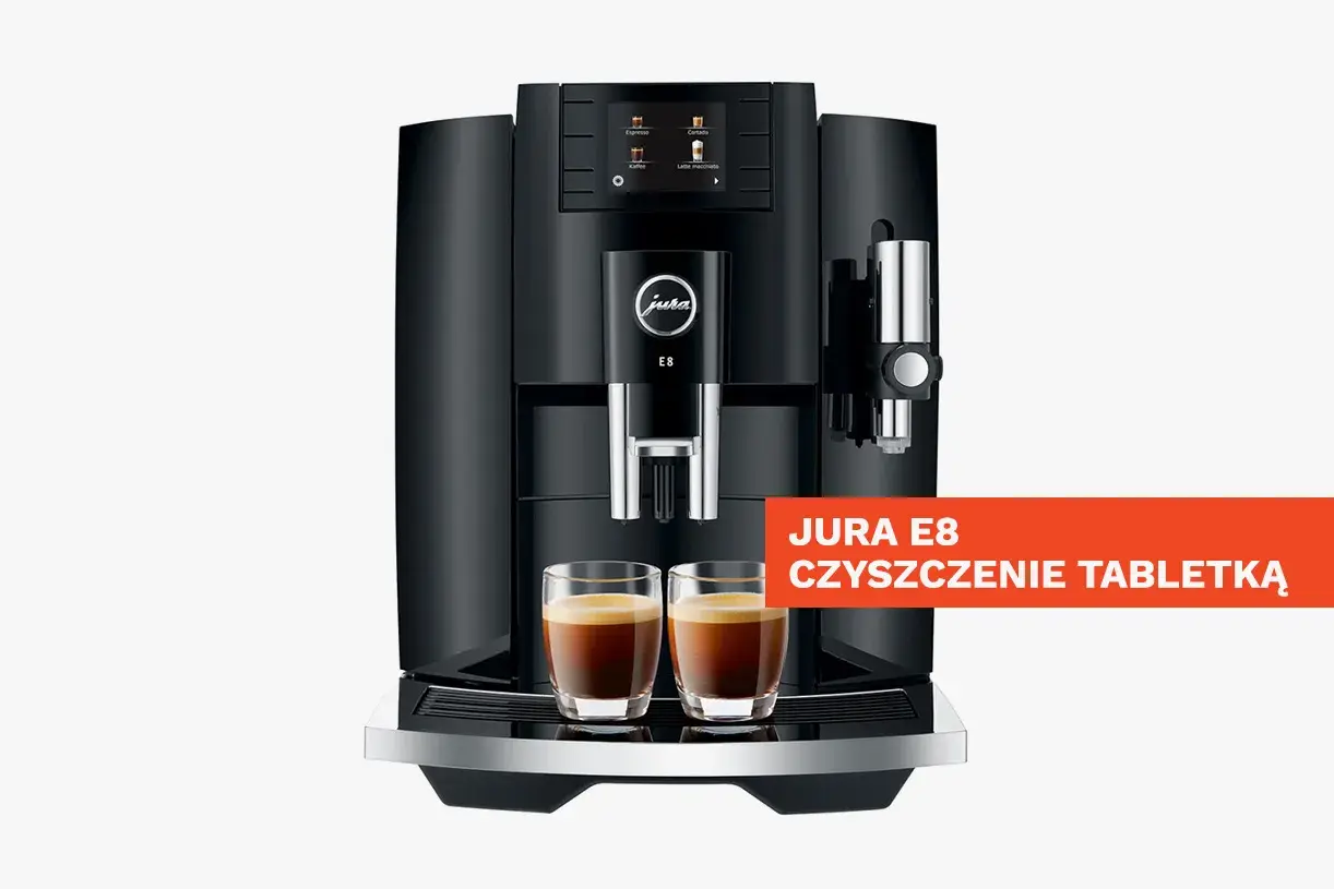 Czarny ekspres Jura E8 z dwoma filiżankami kawy. Wskazówka: jura czyszczenie tabletką.