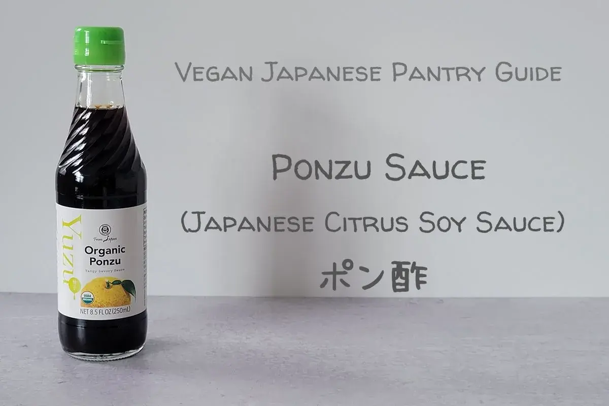 A bottle of Yuzu Organic Ponzu sauce, a tangy Japanese citrus soy sauce, is featured in this vegan pantry guide.