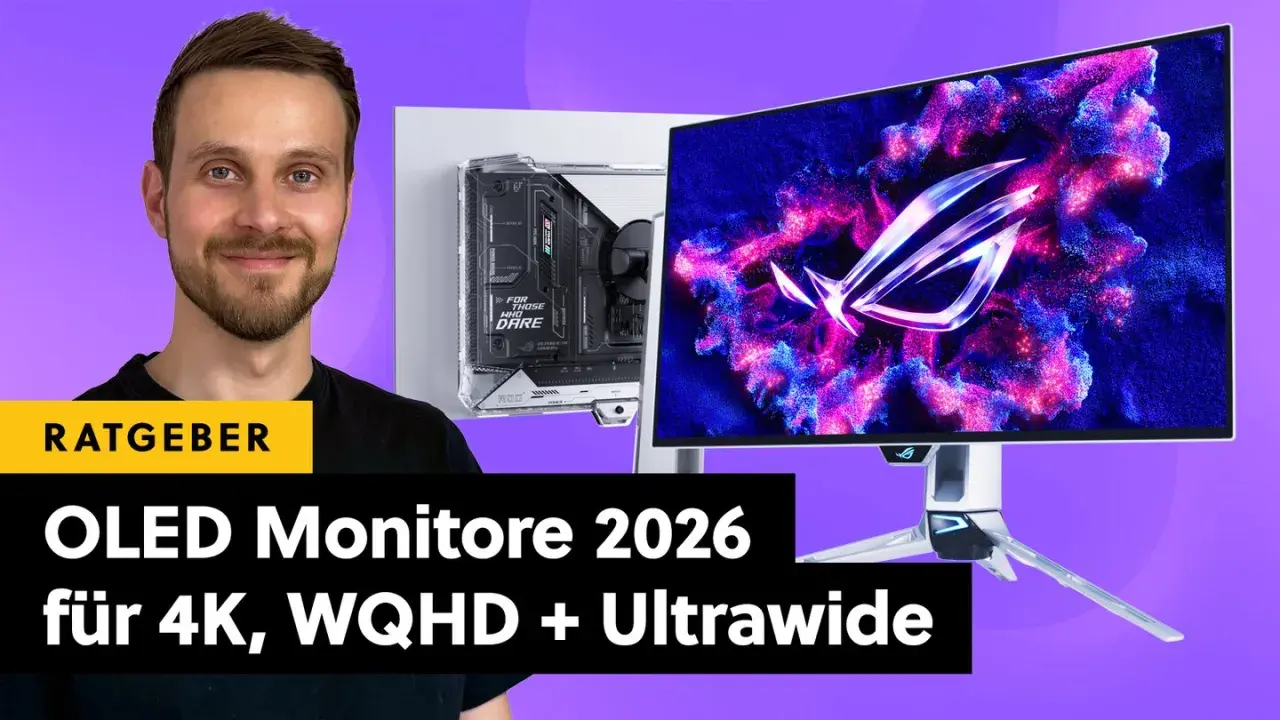 Mann lächelt neben einem PC-Gehäuse und einem OLED Monitor Test mit ROG-Logo. Der Text "OLED Monitore 2026" ist sichtbar.