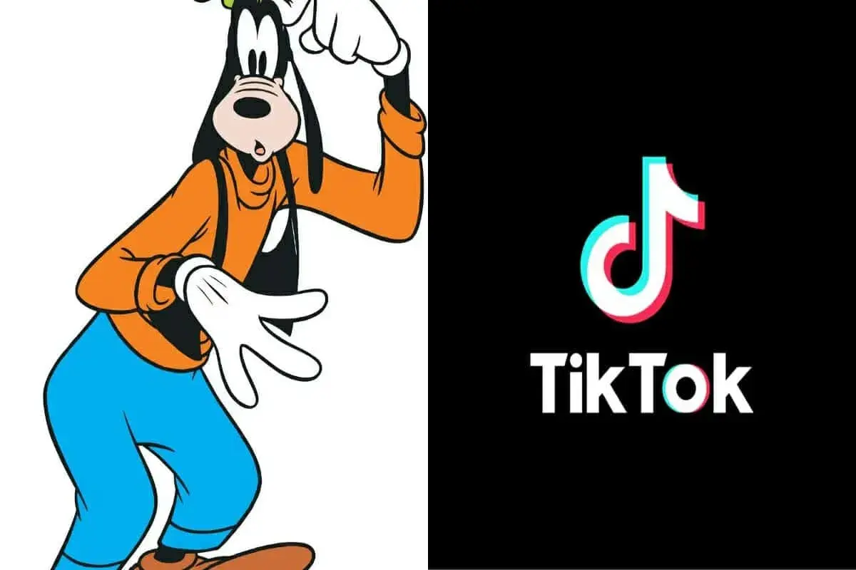 Goofy w pomarańczowej bluzie i niebieskich spodniach, obok logo TikTok. Goofy ahh, jakby tańczył do viralowego trendu.