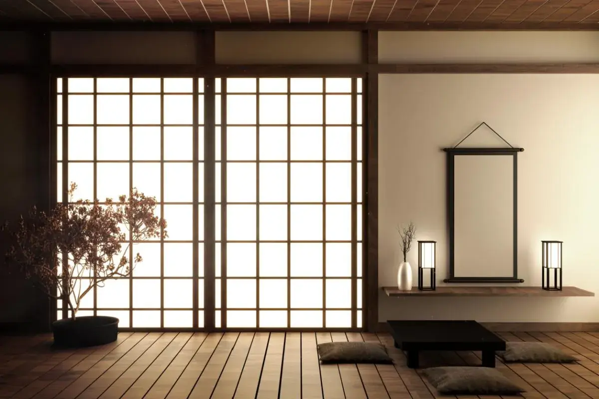Minimalist Japanese room with shoji screen, bonsai tree, and low table.