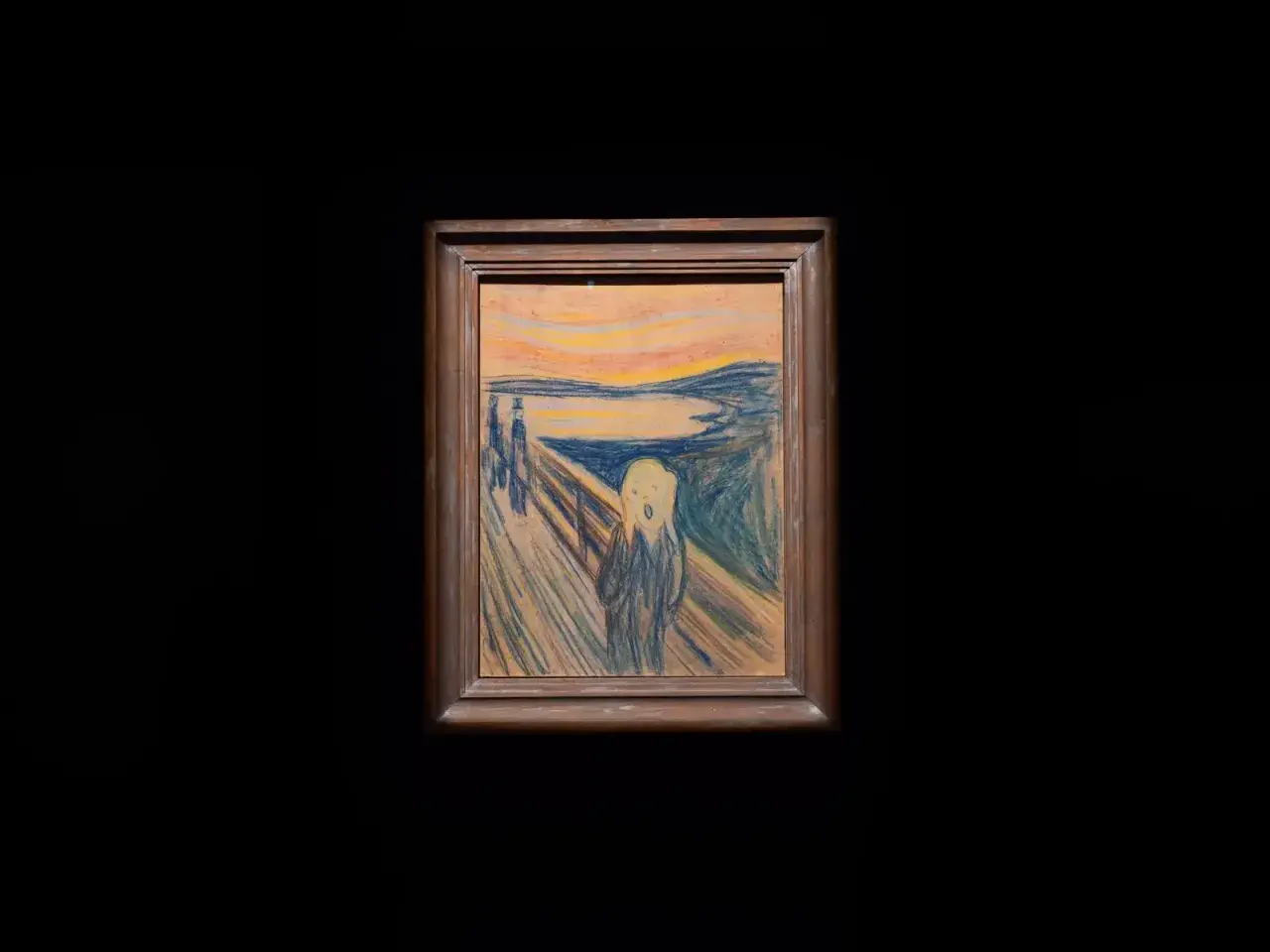 Edvard Munch najsłynniejsze obrazy: przerażona postać na moście krzyczy na tle krwawego nieba.