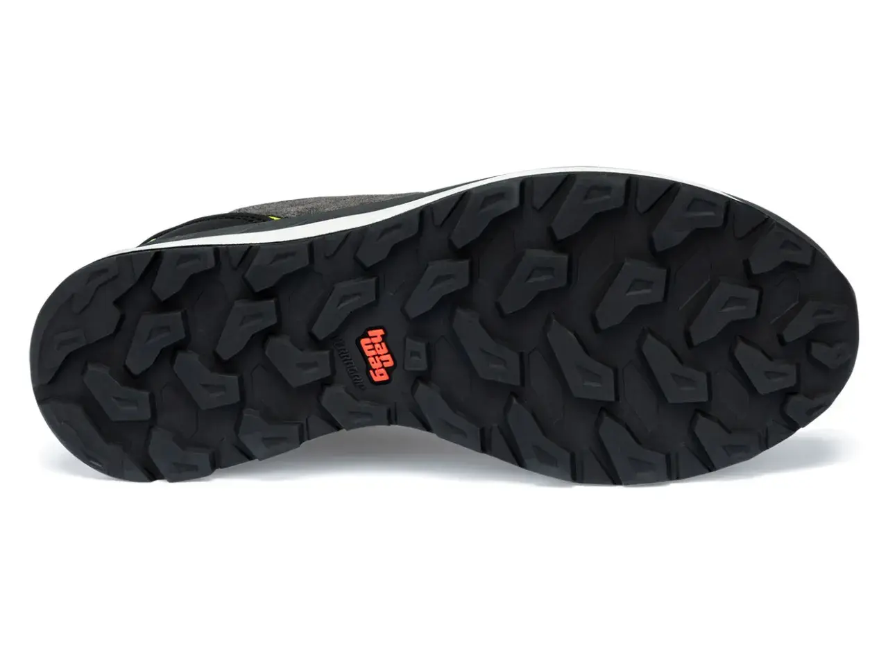 The black outsoles of a hiking shoe feature a deep, aggressive tread pattern for maximum grip. The "Hag" logo is visible in orange.