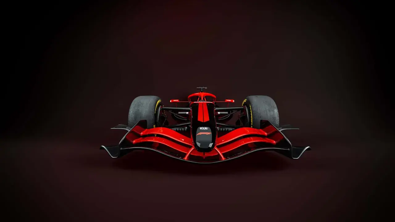 Ein rotes Formel 1 Auto mit schwarzer Nase und Streifen. Das Gewicht eines Formel 1 Autos ist entscheidend für die Performance.