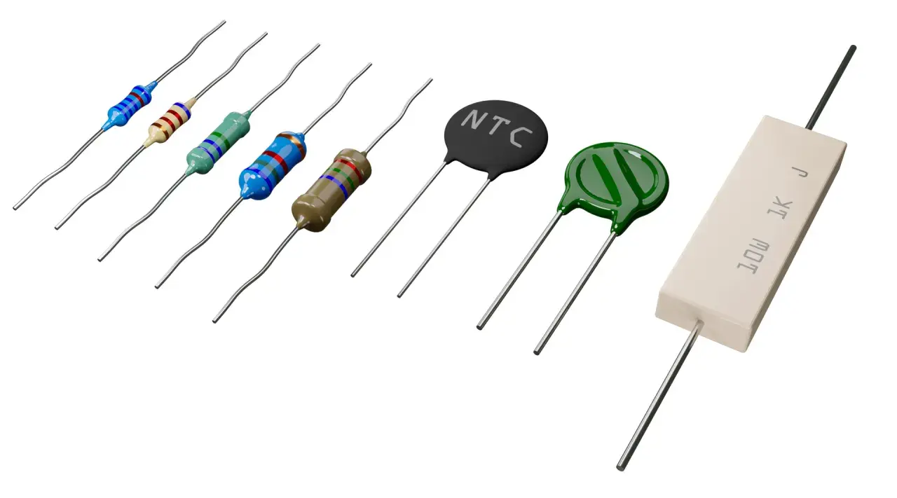 Różnorodne elementy elektroniczne: rezystory kolorowe, termistor NTC, warystor i rezystor ceramiczny.