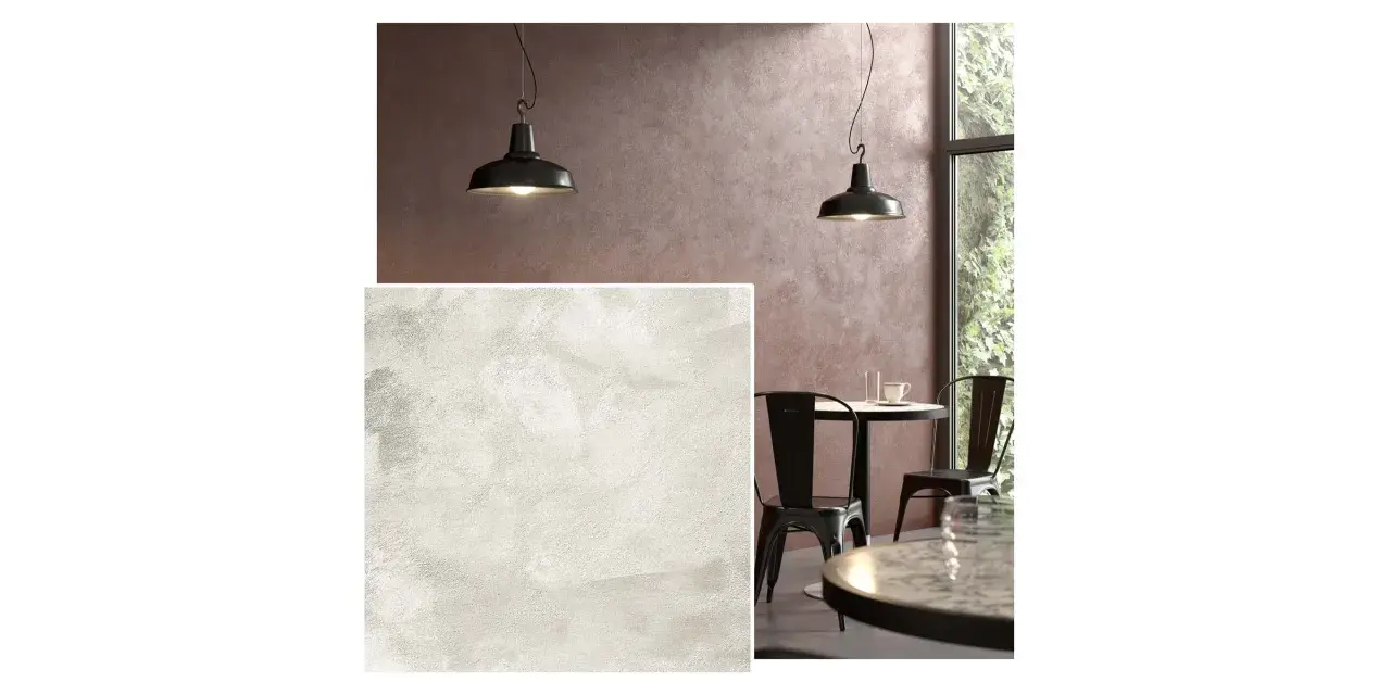 Pittura sabbia con texture materica, che evoca un'atmosfera calda e naturale, perfetta per interni moderni.