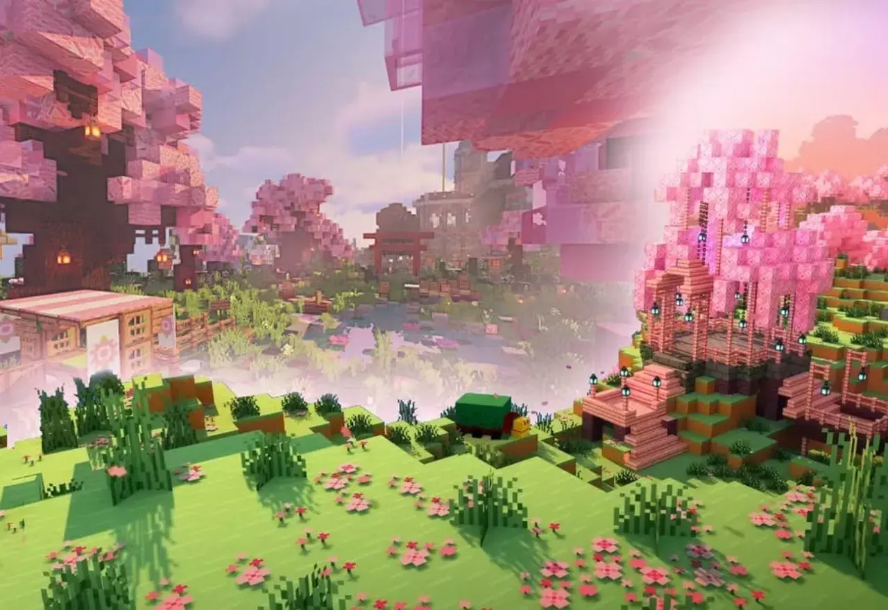 Magiczny świat Minecraft z kwitnącymi wiśniami, japońską architekturą i domkami. To jedne z najlepszych seedów w Minecraft, jakie można znaleźć!