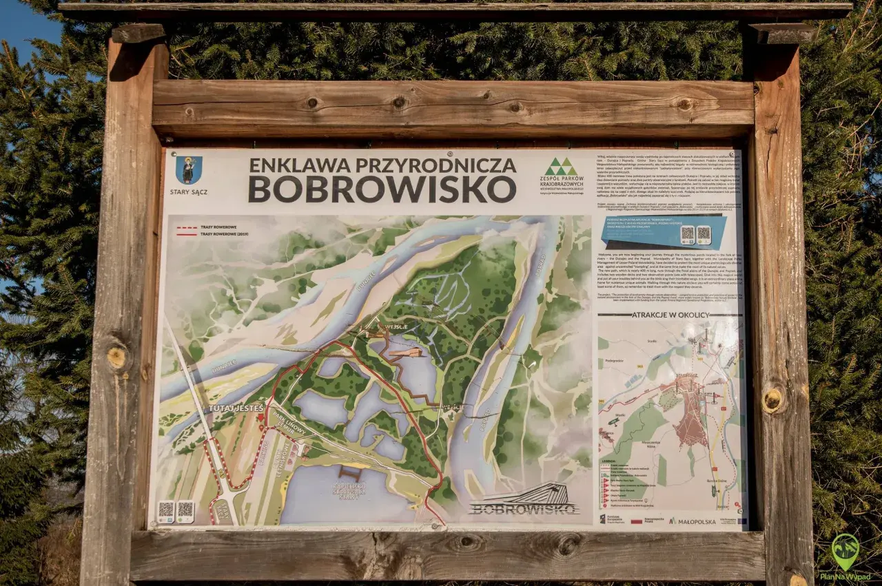Mapa Enklawy Przyrodniczej Bobrowisko koło Starego Sącza. Pokazuje szlaki rowerowe, rzeki Dunajec i Poprad oraz punkty widokowe.
