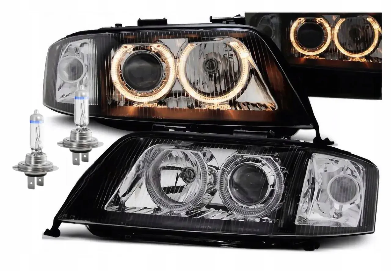 Nowe lampy do Audi A6 C5 z ringami i żarówkami.