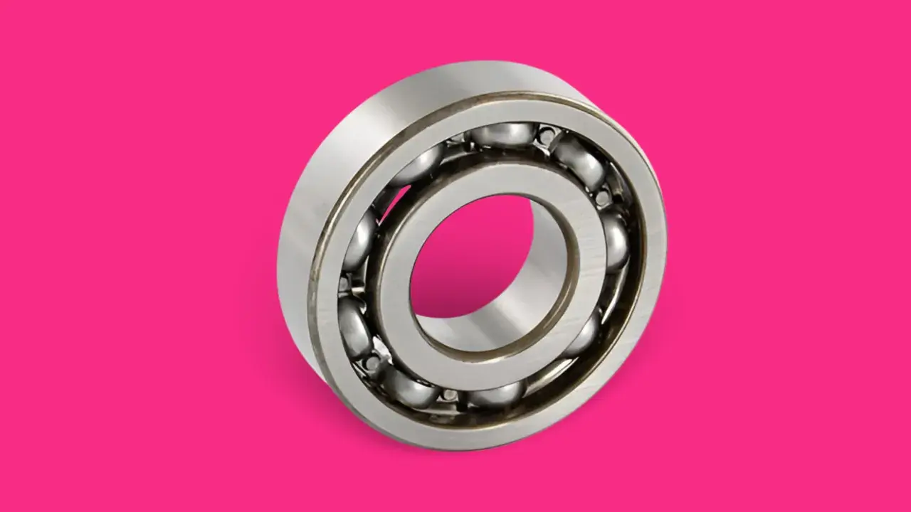 Un cojinete de rueda, esencial para el movimiento suave, con esferas metálicas dentro de anillos.