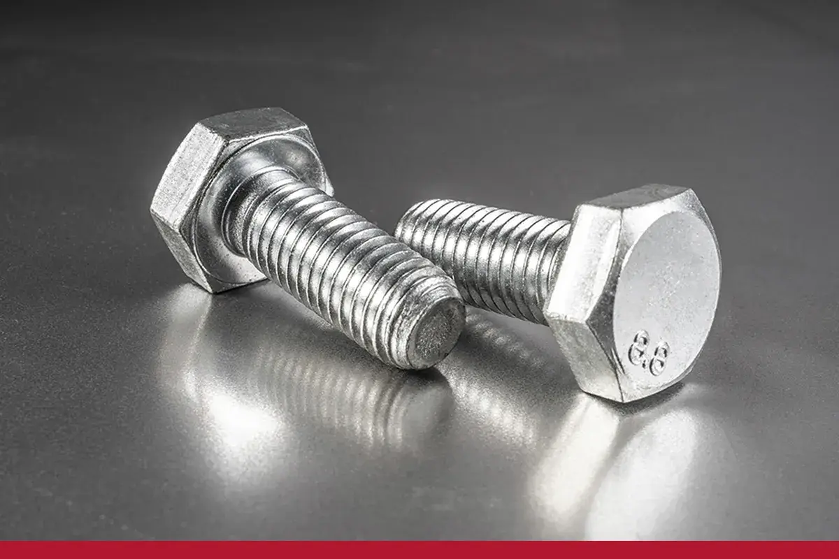 Dos tornillos hexagonales metálicos, mostrando diferentes tipos de cabezas de tornillos especiales.