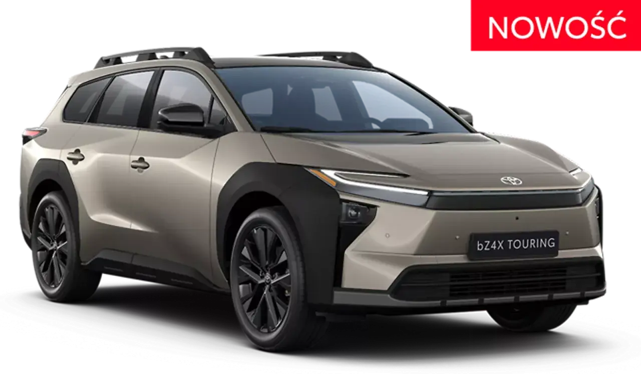 Nowy, beżowy Toyota bZ4X Touring z czarnymi dodatkami i relingami dachowymi, gotowy na każdą podróż.