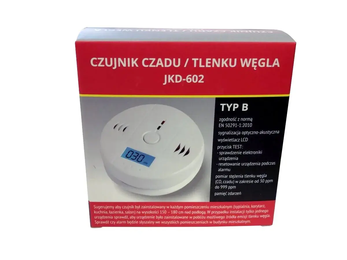 Biały czujnik czadu z wyświetlaczem LCD pokazującym "030" na tle czerwonego opakowania.