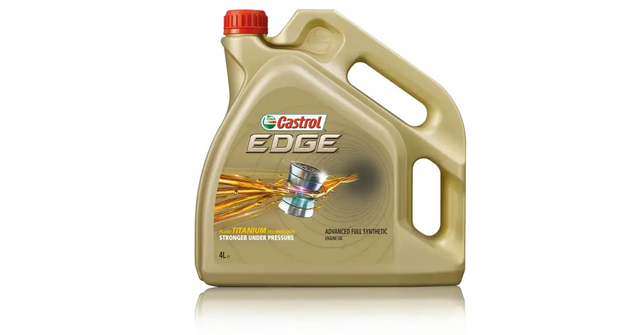 Złoty kanister oleju silnikowego Castrol EDGE z czerwonym korkiem i grafiką.