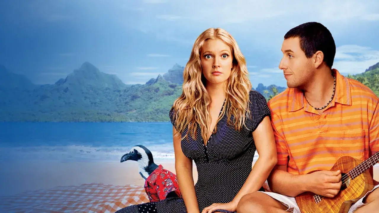 Drew Barrymore i Adam Sandler, czyli 50 pierwszych randek obsada, siedzą na plaży z pingwinem.