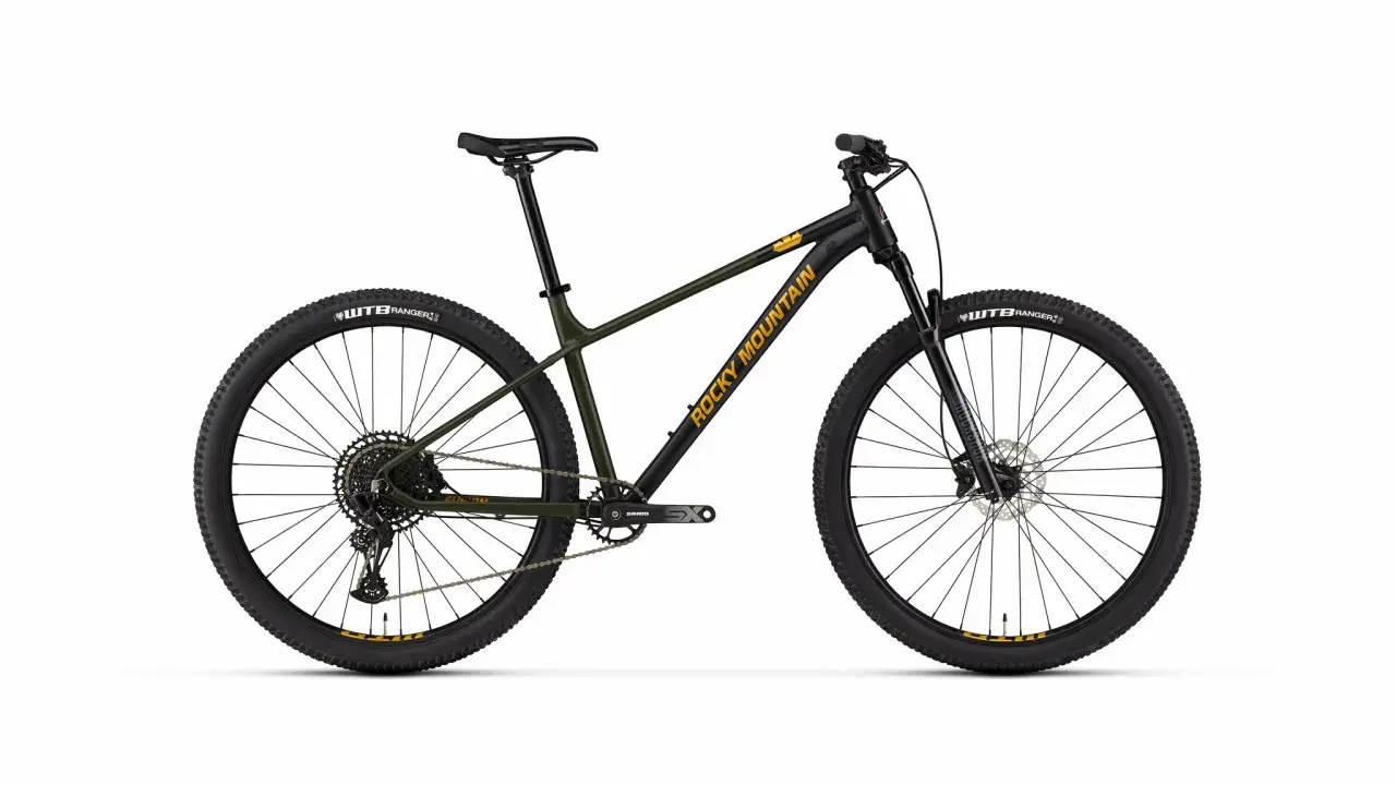 A black and green Rocky Mountain bicycle, ready for trail adventures. Read our rocky mountain bicycle reviews to find your next ride.