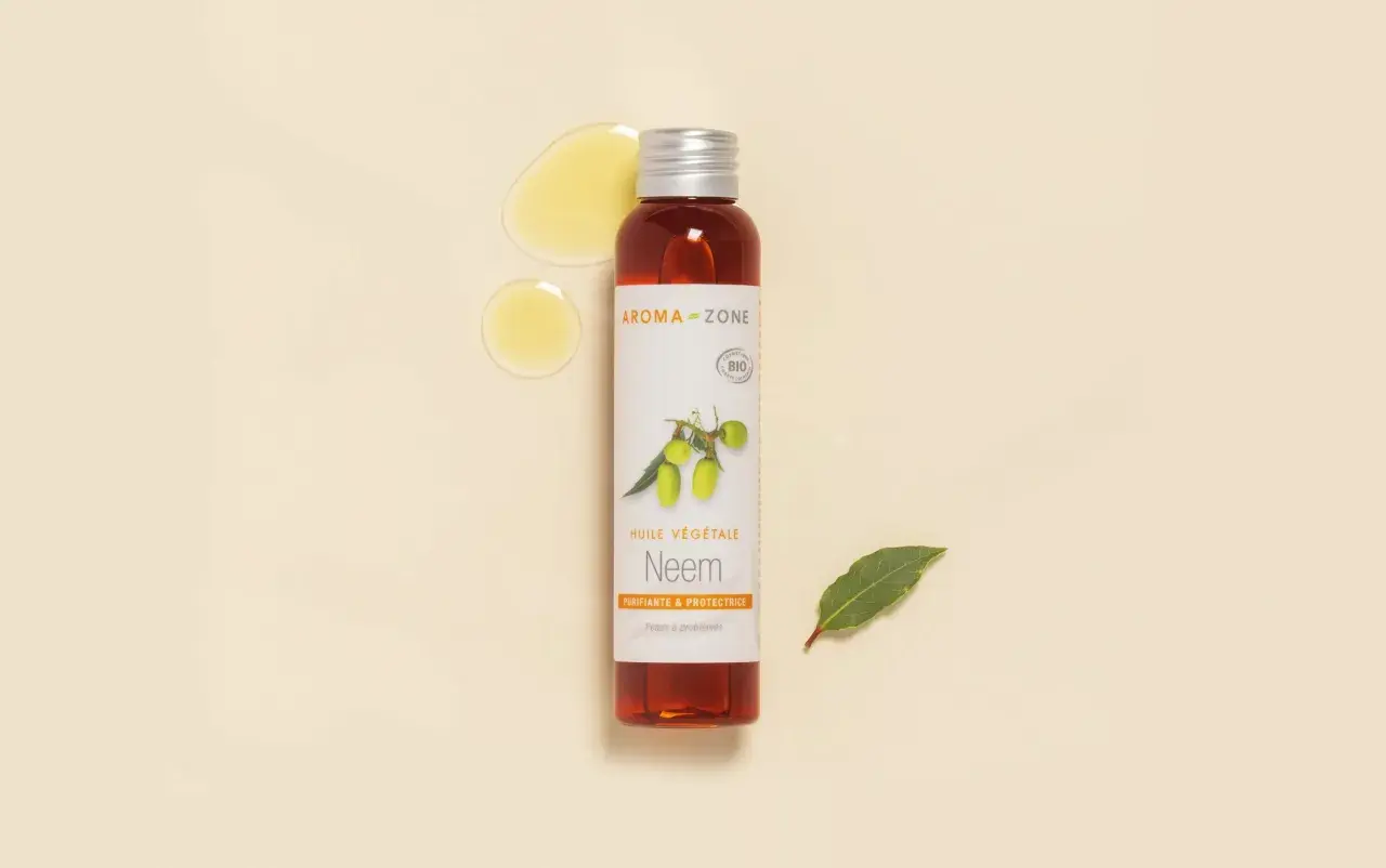 Flacon d'huile végétale de Neem bio, purifiante et protectrice pour peaux à problèmes. Découvrez les bienfaits de l'huile de neem.