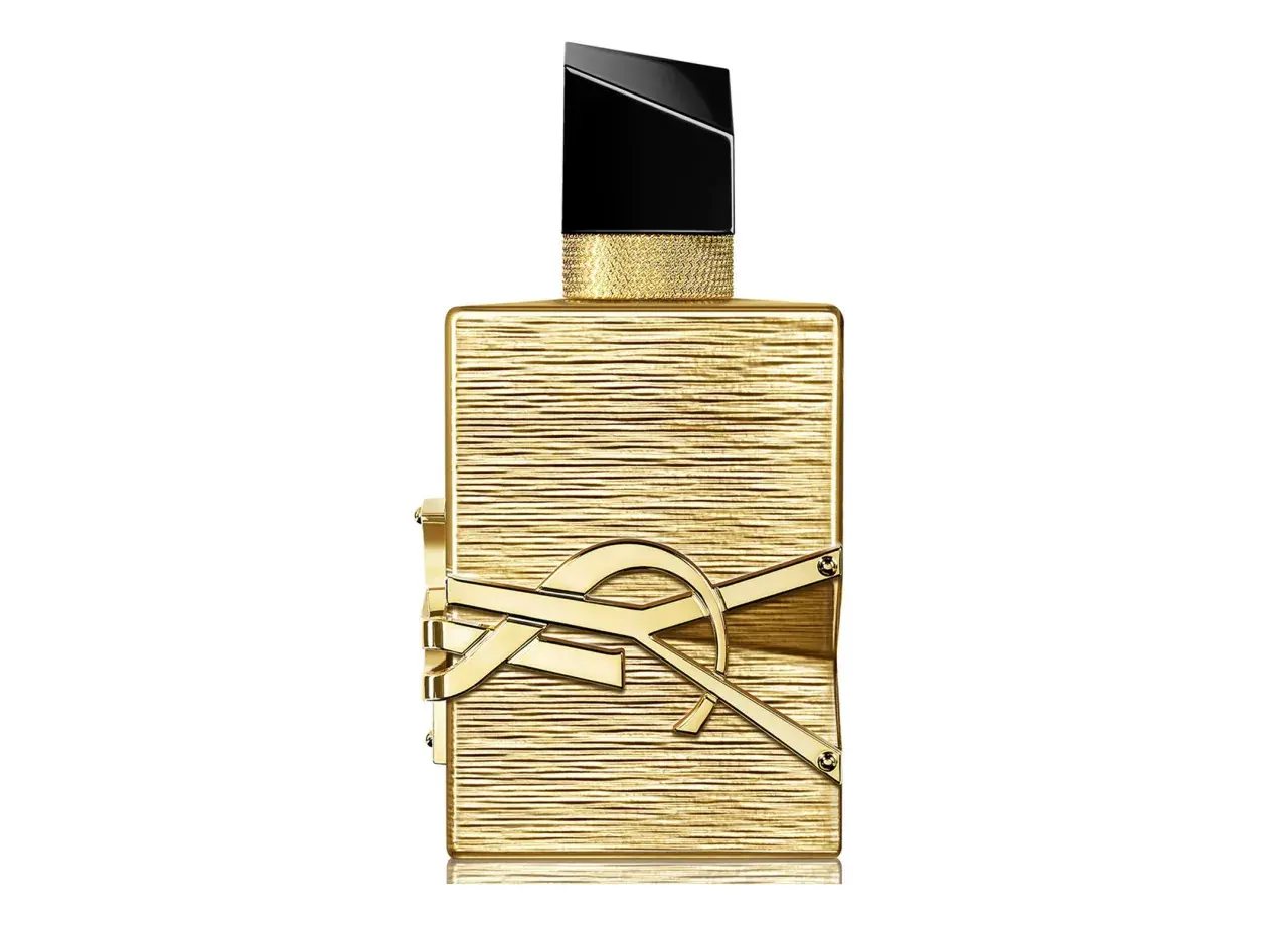 Złoty flakon perfum Libre 100ml z czarną nakrętką i złotym logo YSL.