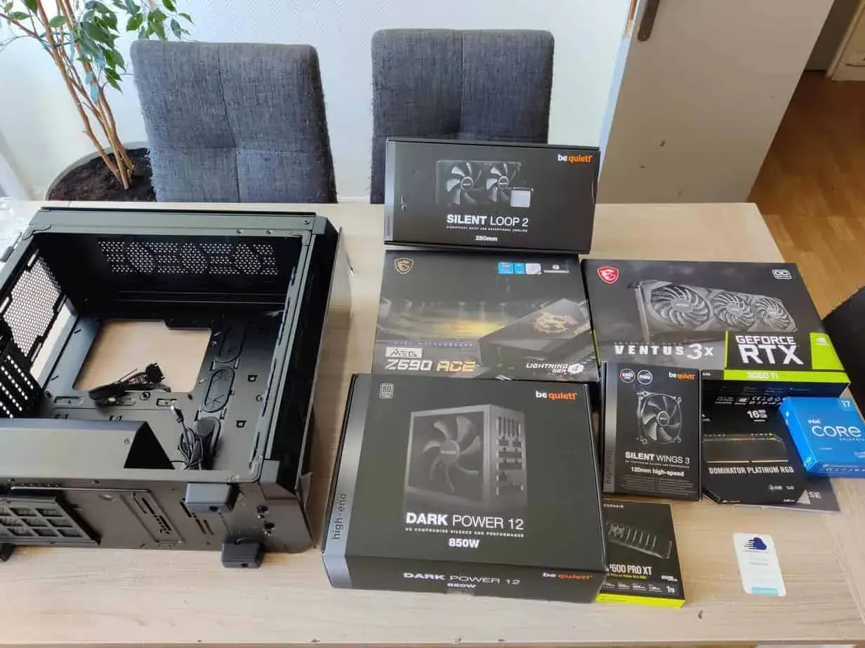 Liste de composants PC gamer : boîtier, carte mère, alimentation, carte graphique RTX 3060 Ti, watercooling, ventilateurs et RAM.