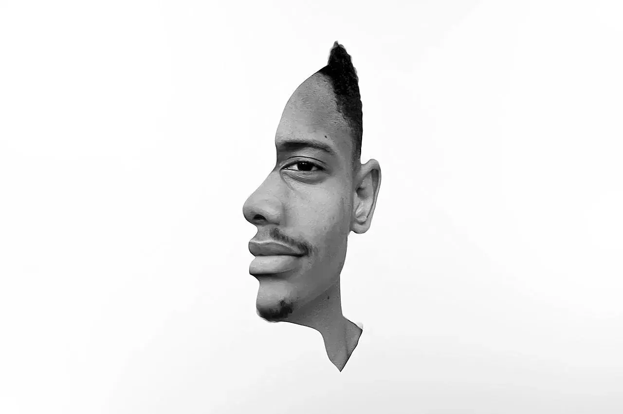 Portrait fusain d'un artiste connu, une illusion d'optique où deux visages se font face.