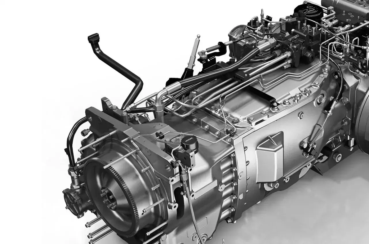 Skrzynia biegów ATF II D z licznymi przewodami hydraulicznymi i elementami mechanicznymi, gotowa do pracy.
