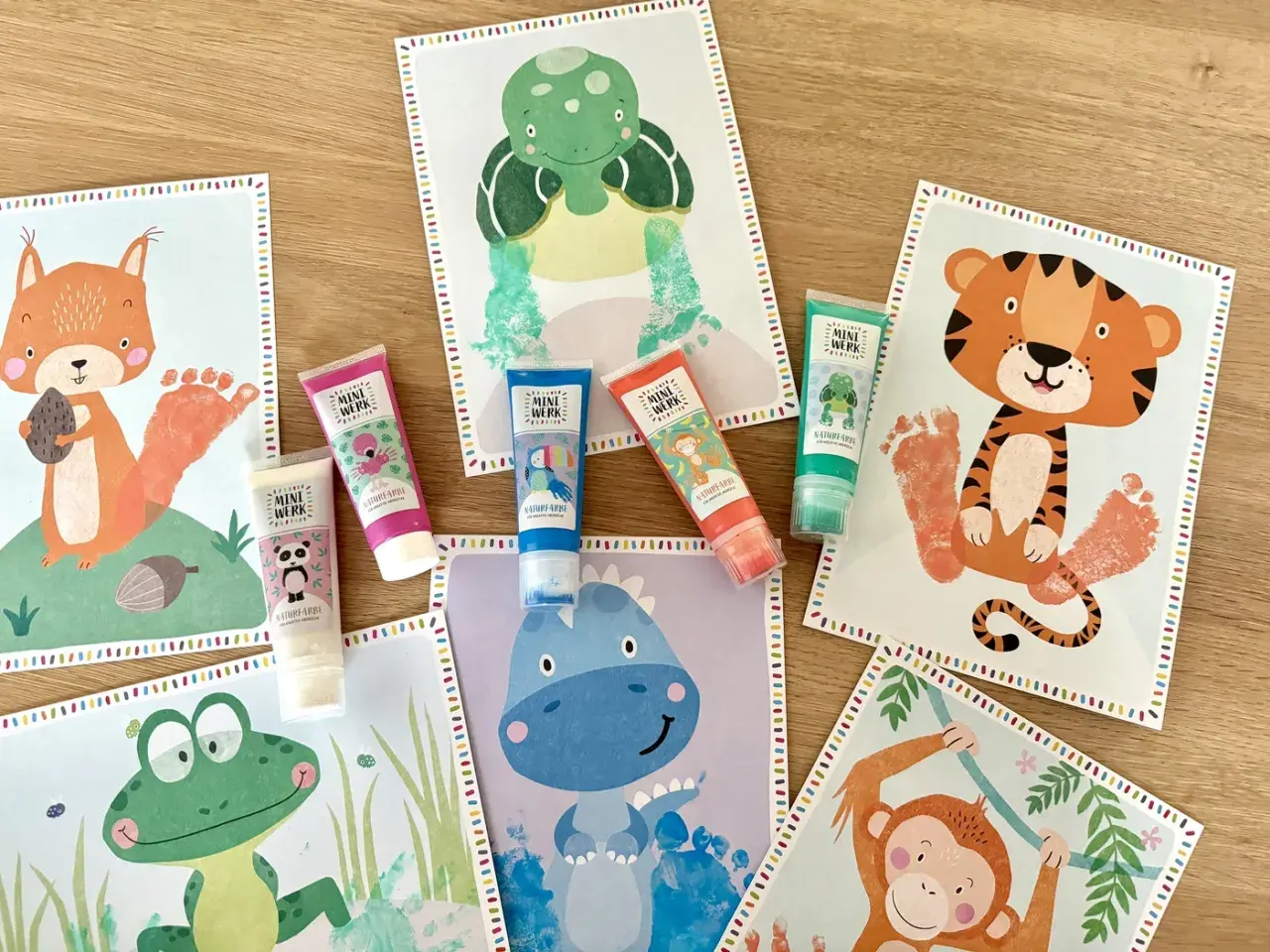 Kreative Fingerfarben Ideen: Bunte Tierbilder mit Hand- und Fußabdrücken entstehen. Perfekt für kleine Künstler!