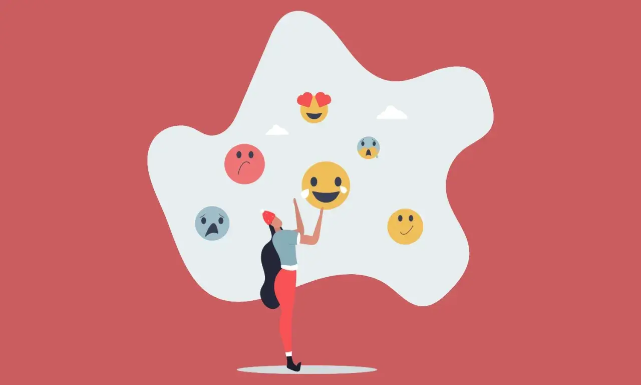 Una persona rodeada de emojis que reflejan sentimientos encontrados.